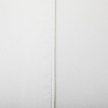 Matching piping on pillowcases and duvet covers